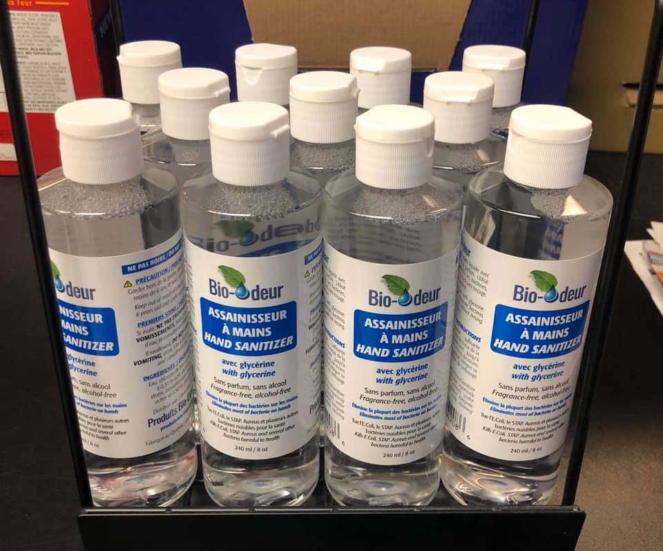 Hand sanitizer bottles stocked on shelf